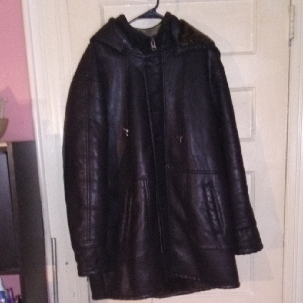 Sleek Black Leather Jacket with Minimalist Design